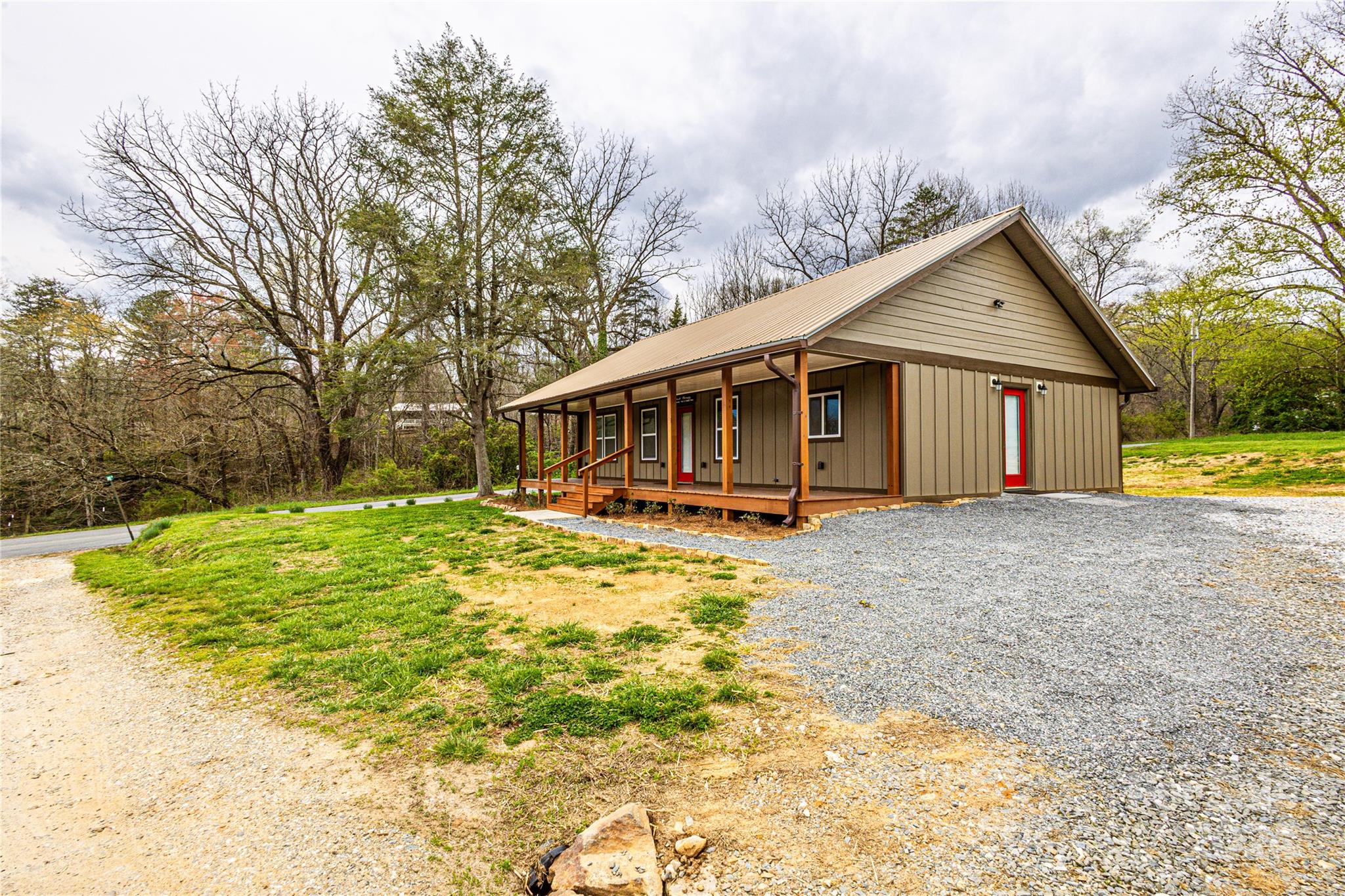 1233 Bryson Branch Road Bryson City, NC 28713 - Photo 19 of 28 a view of a house with pool and yard