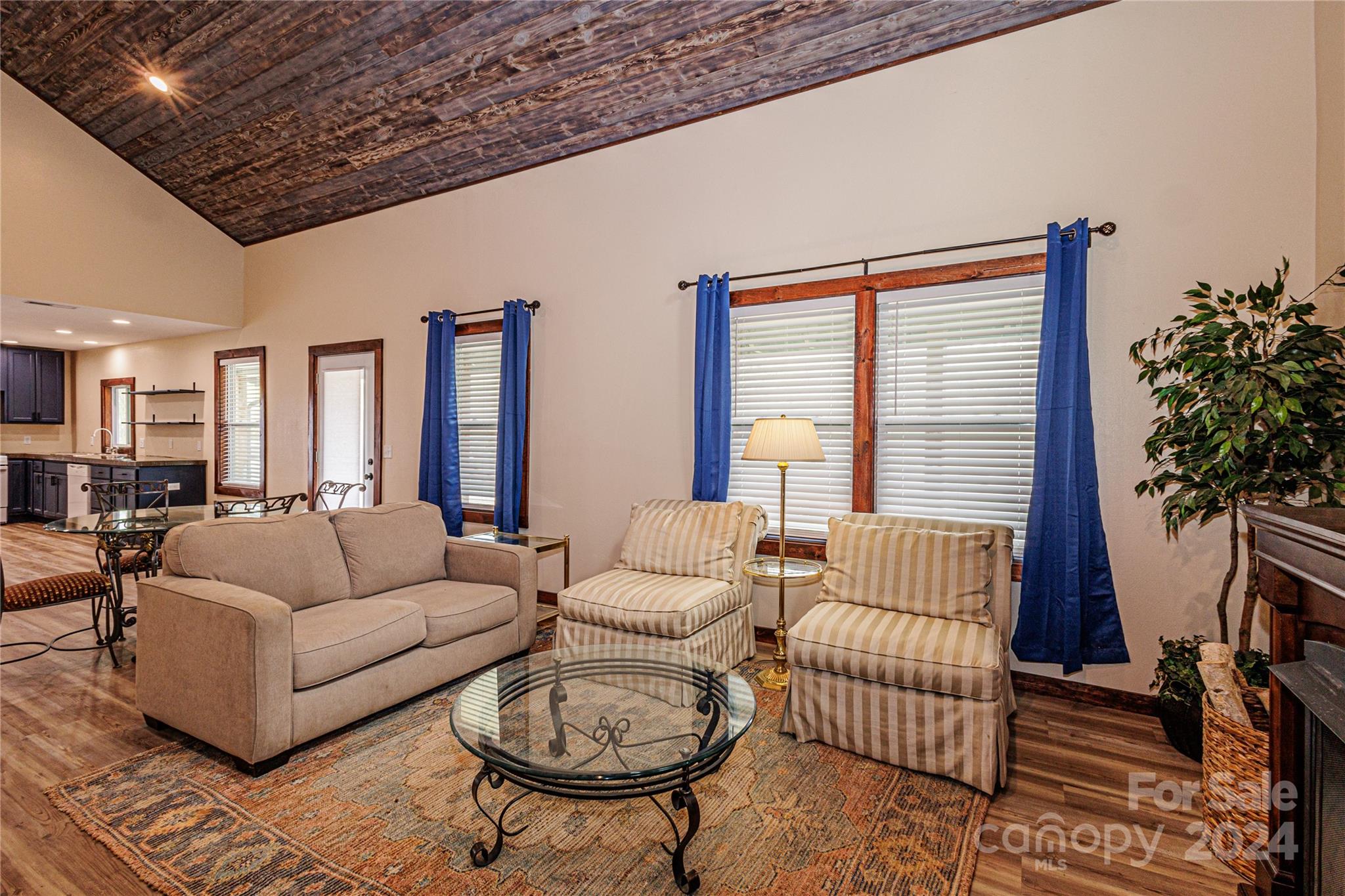 1233 Bryson Branch Road Bryson City, NC 28713 - Photo 5 of 28 a living room with furniture and a large window