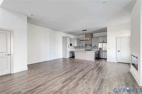 a view of kitchen with wooden floor