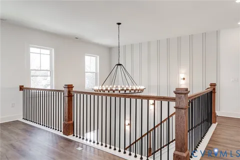 a view of a balcony with wooden floor