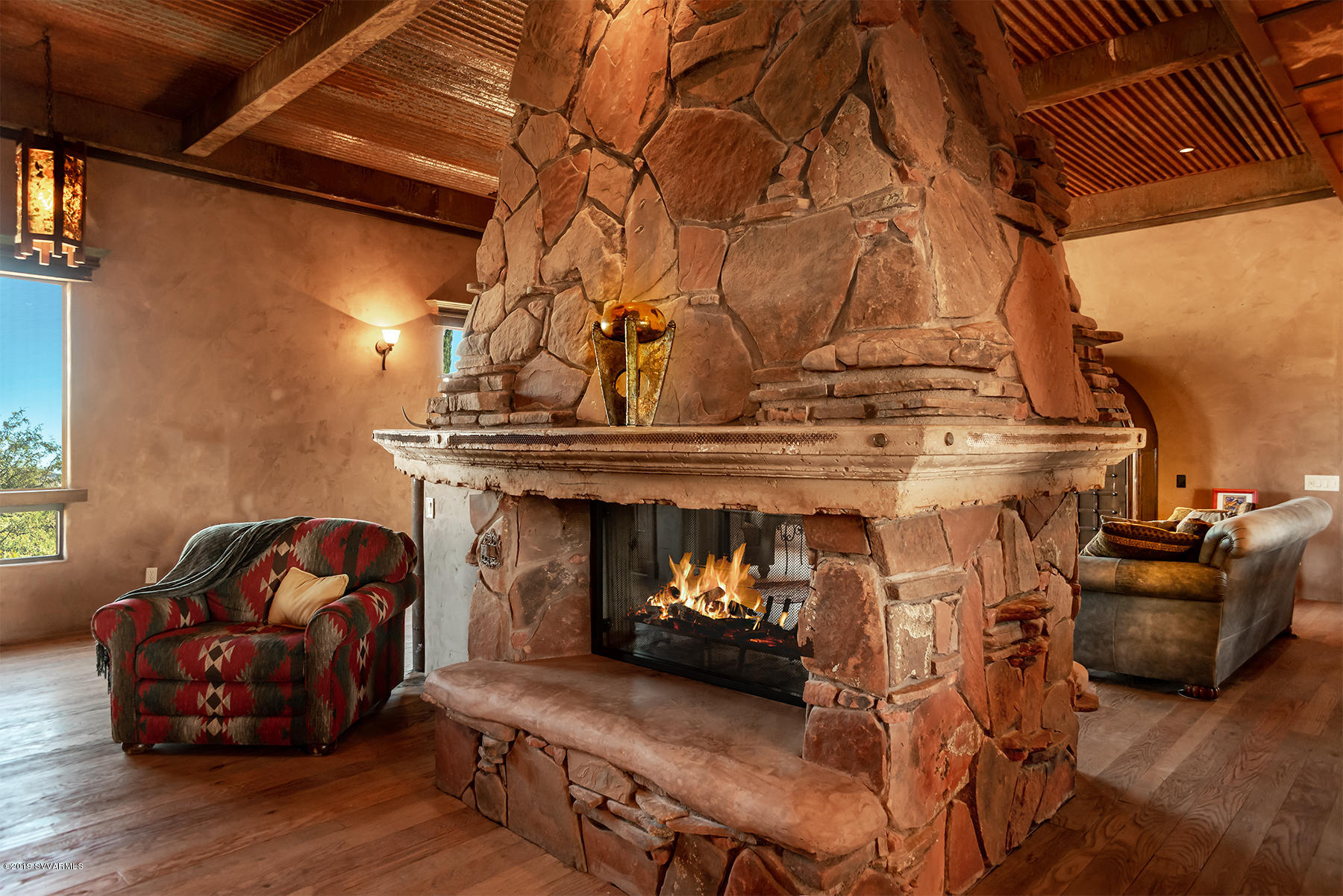 180 North Merritt Ranch Road Cornville, AZ 86325 - Photo 6 of 42 Kitchen Lounge Side of Fireplace