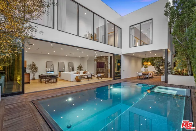 a view of a living room and dining room