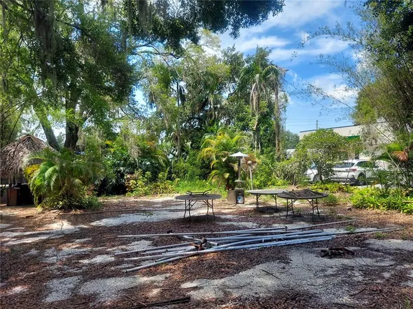 a view of backyard with green space