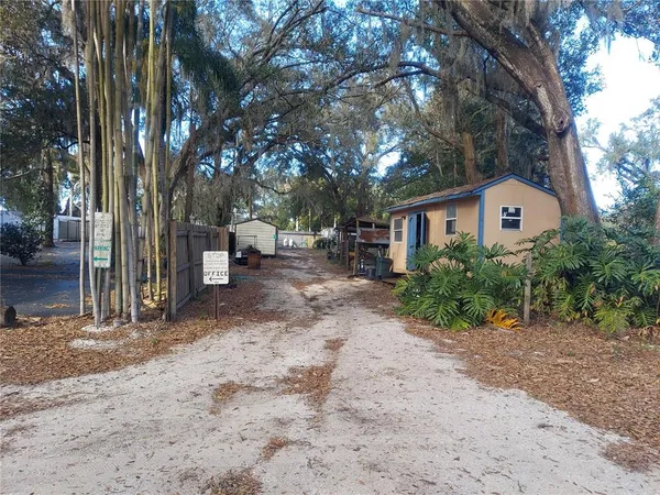 a house with a tree in front of it