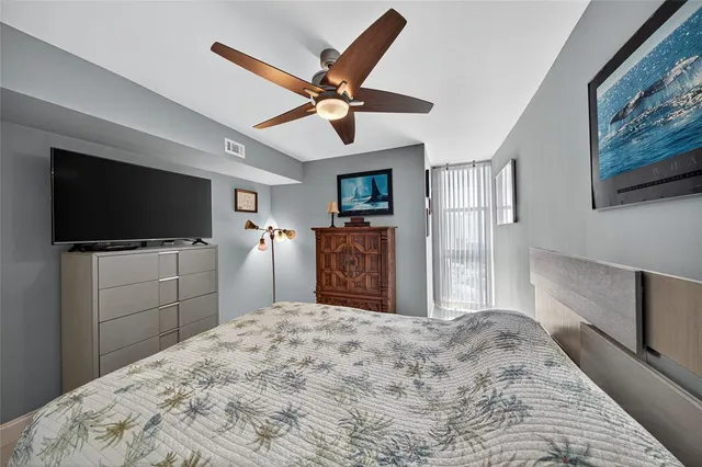 a large room with lots of wooden furniture and a porch