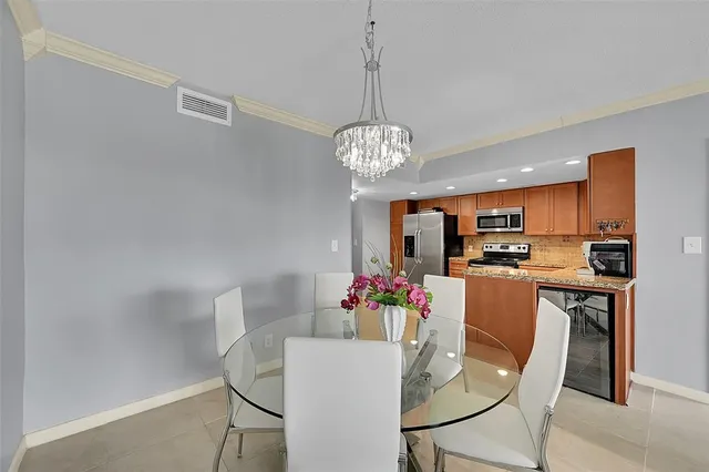 a living room with furniture and a lamp