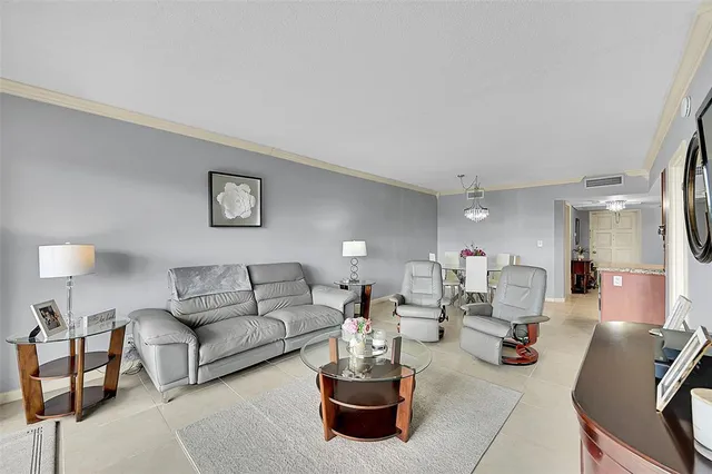 a bathroom with a sink a toilet and shower curtain