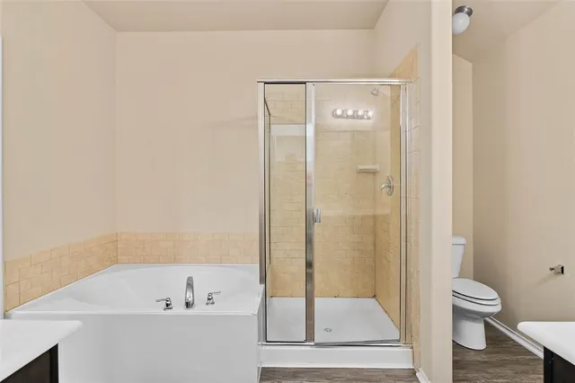 a bathroom with a bathtub and a sink