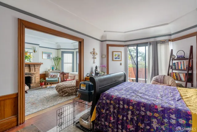 a bathroom with a sink a toilet and a shower curtain