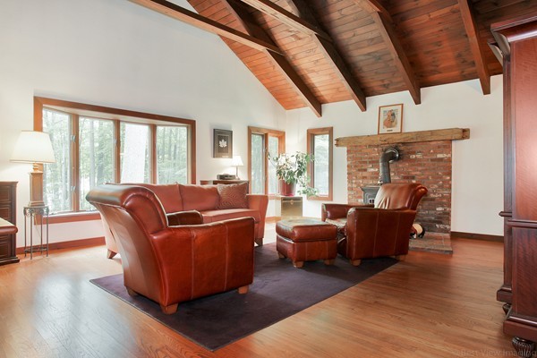 561 Leadmine Road Sturbridge, MA 01566 - Photo 13 of 21 a living room with furniture and a fireplace