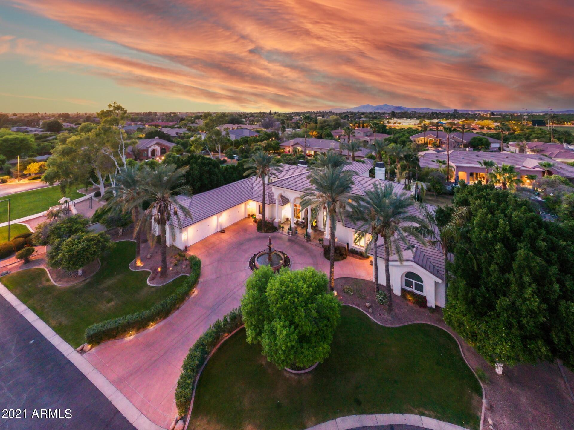 4040 East McLellan Road, Unit 8 Mesa, AZ 85205 - Photo 103 of 105 an aerial view of a house with a garden