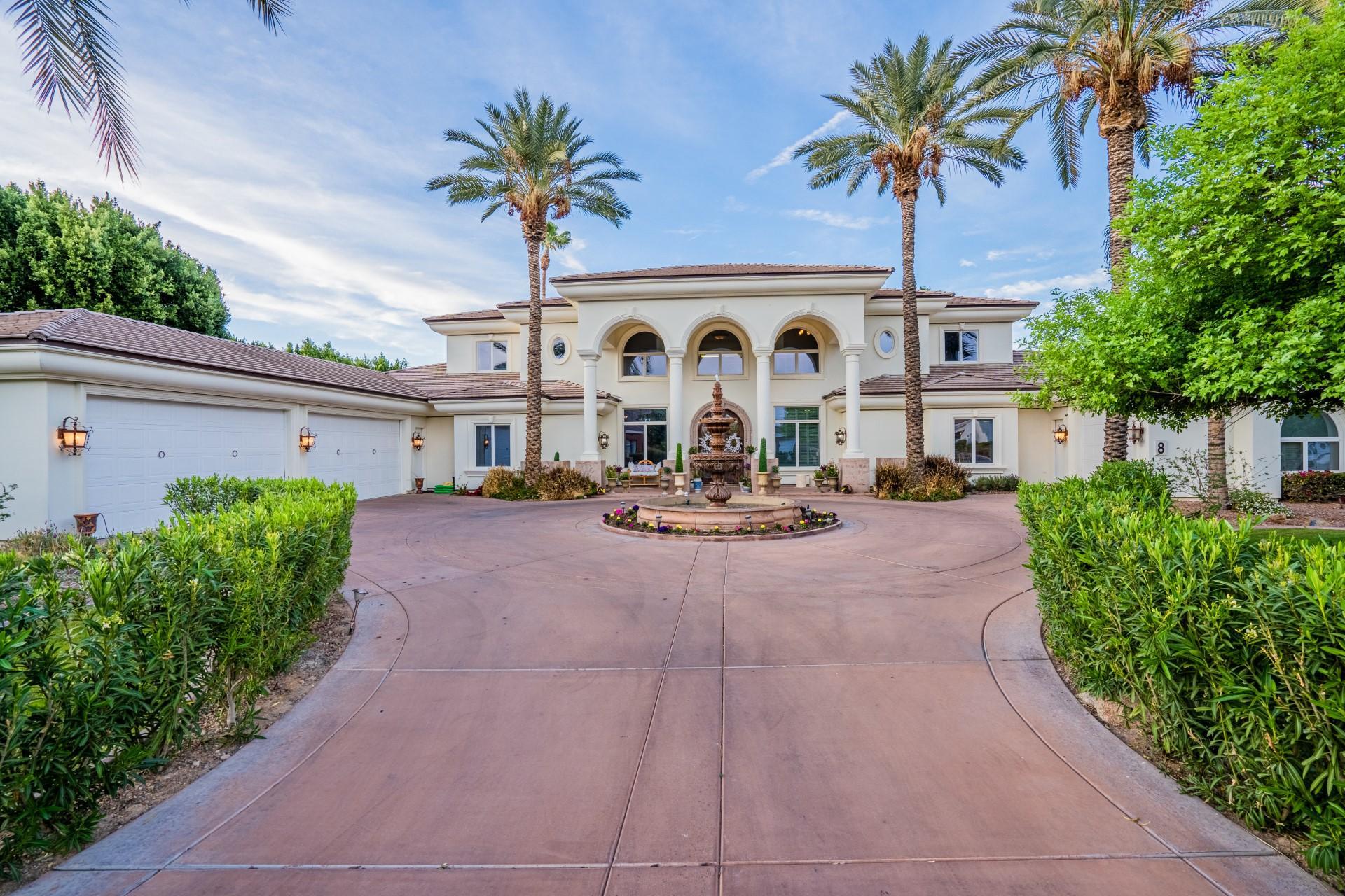 4040 East McLellan Road, Unit 8 Mesa, AZ 85205 - Photo 11 of 105 a front view of a house with garden and parking