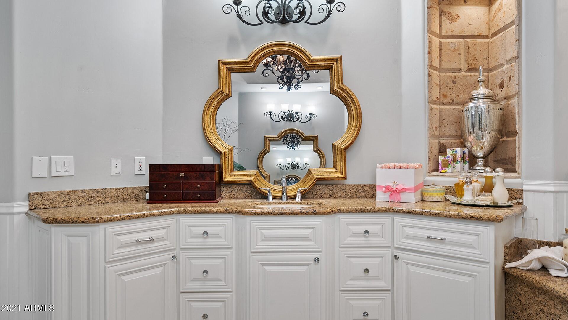 4040 East McLellan Road, Unit 8 Mesa, AZ 85205 - Photo 47 of 105 a close view of a sink and cabinets