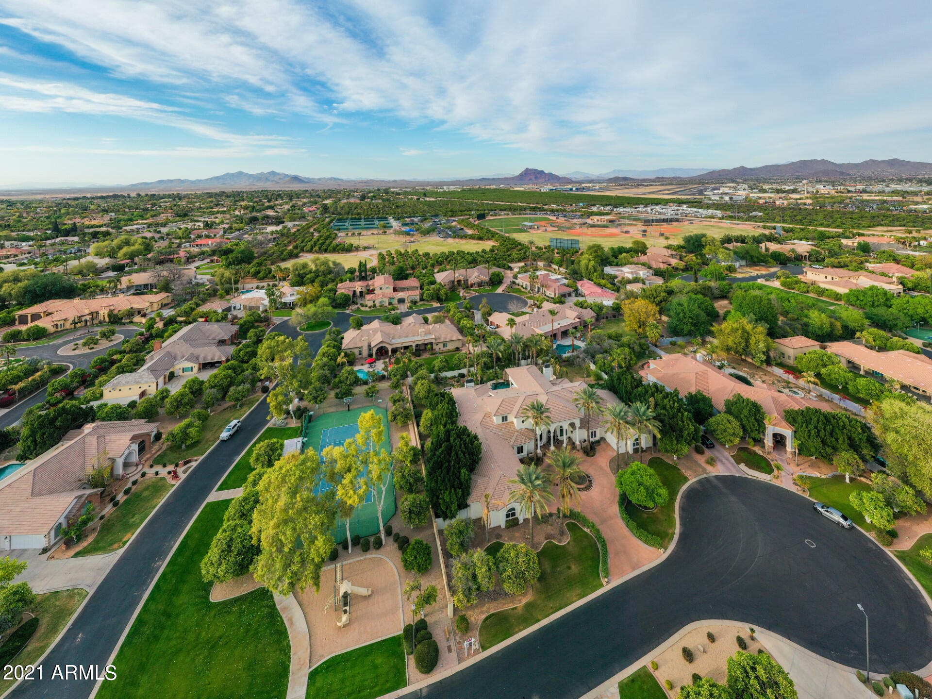 4040 East McLellan Road, Unit 8 Mesa, AZ 85205 - Photo 92 of 105 an aerial view of residential houses with outdoor space