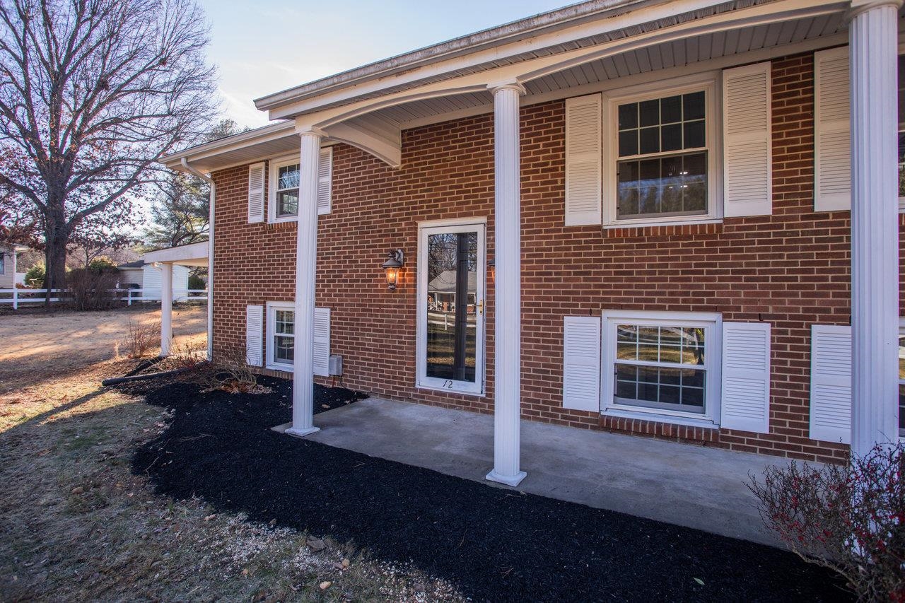 12 Essex Road Grottoes, VA 24441 - Photo 56 of 65 a front view of a house with a yard