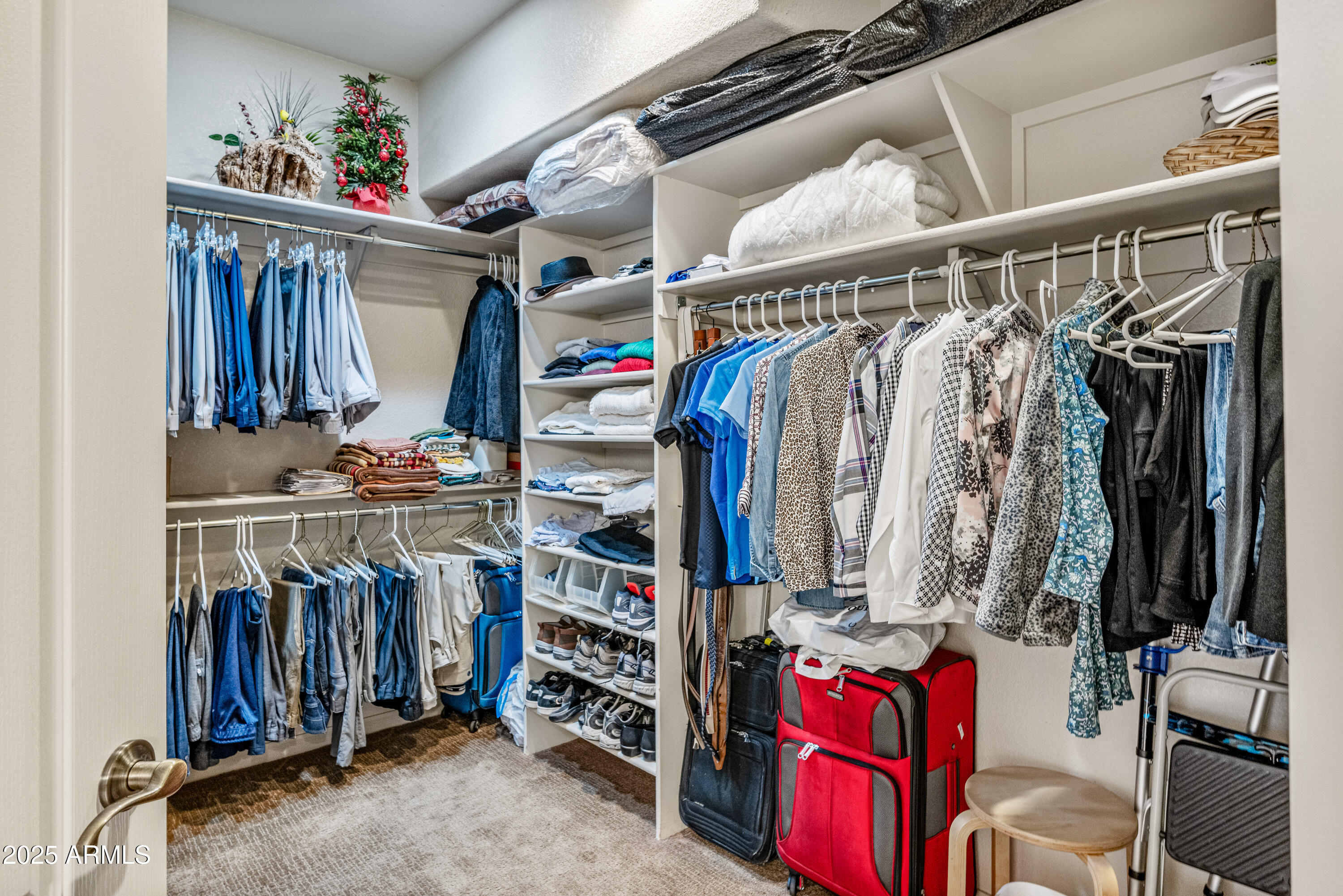 18300 North Tonto Verde Drive Rio Verde, AZ 85263 - Photo 21 of 35 a view of walk in closet with clothes and shoes