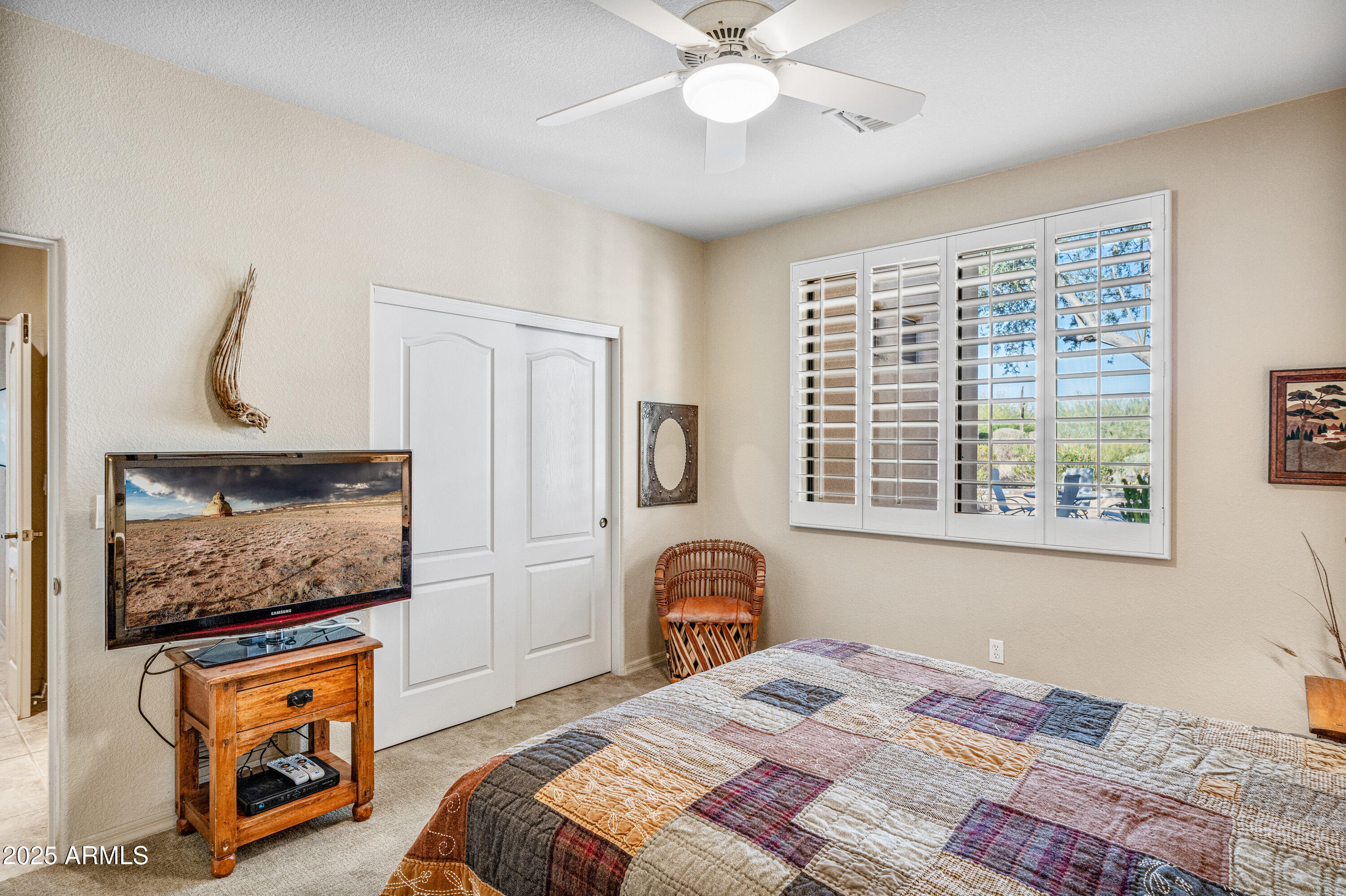 18300 North Tonto Verde Drive Rio Verde, AZ 85263 - Photo 23 of 35 a bedroom with furniture and a flat screen tv