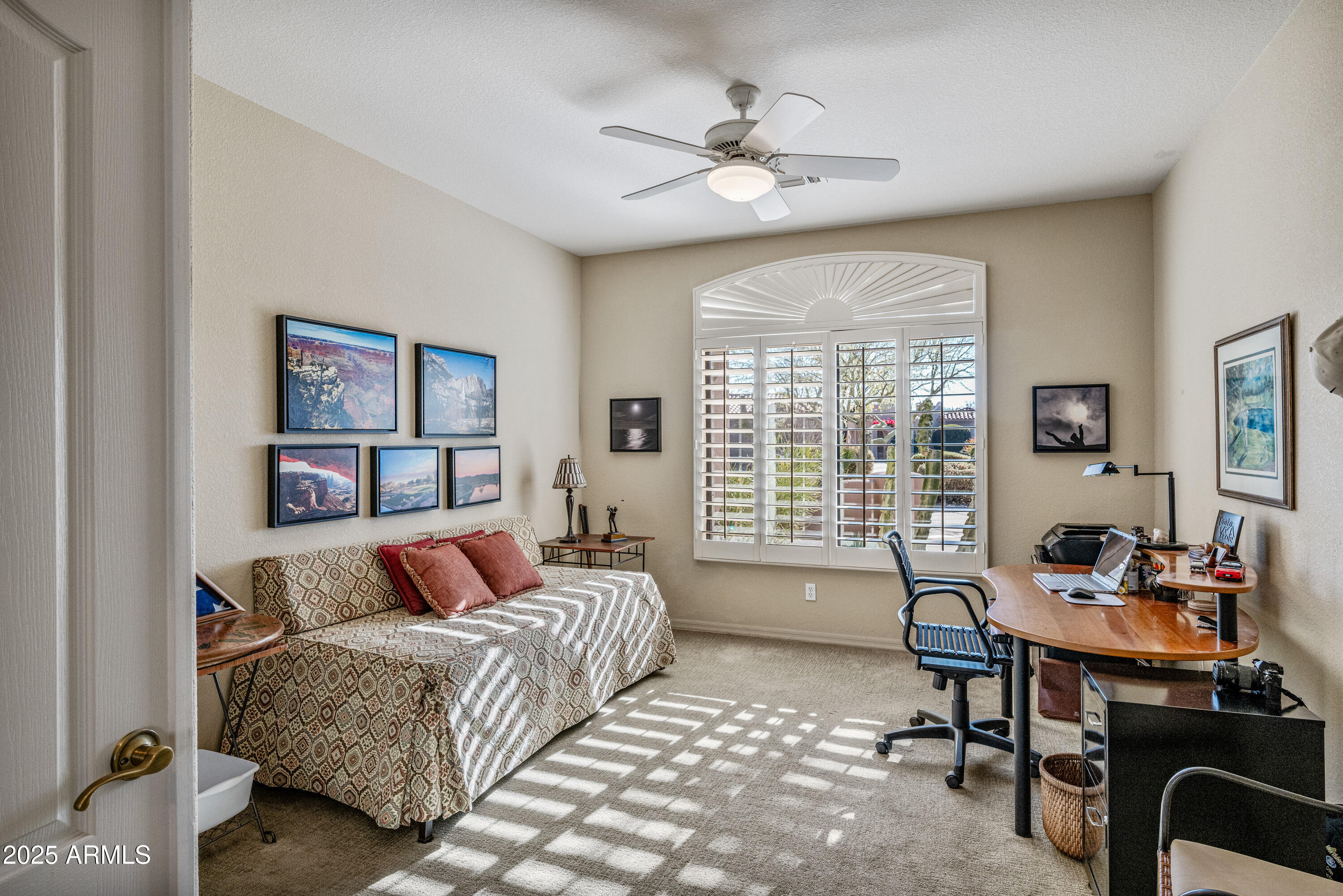 18300 North Tonto Verde Drive Rio Verde, AZ 85263 - Photo 25 of 35 a living room with furniture and a large window