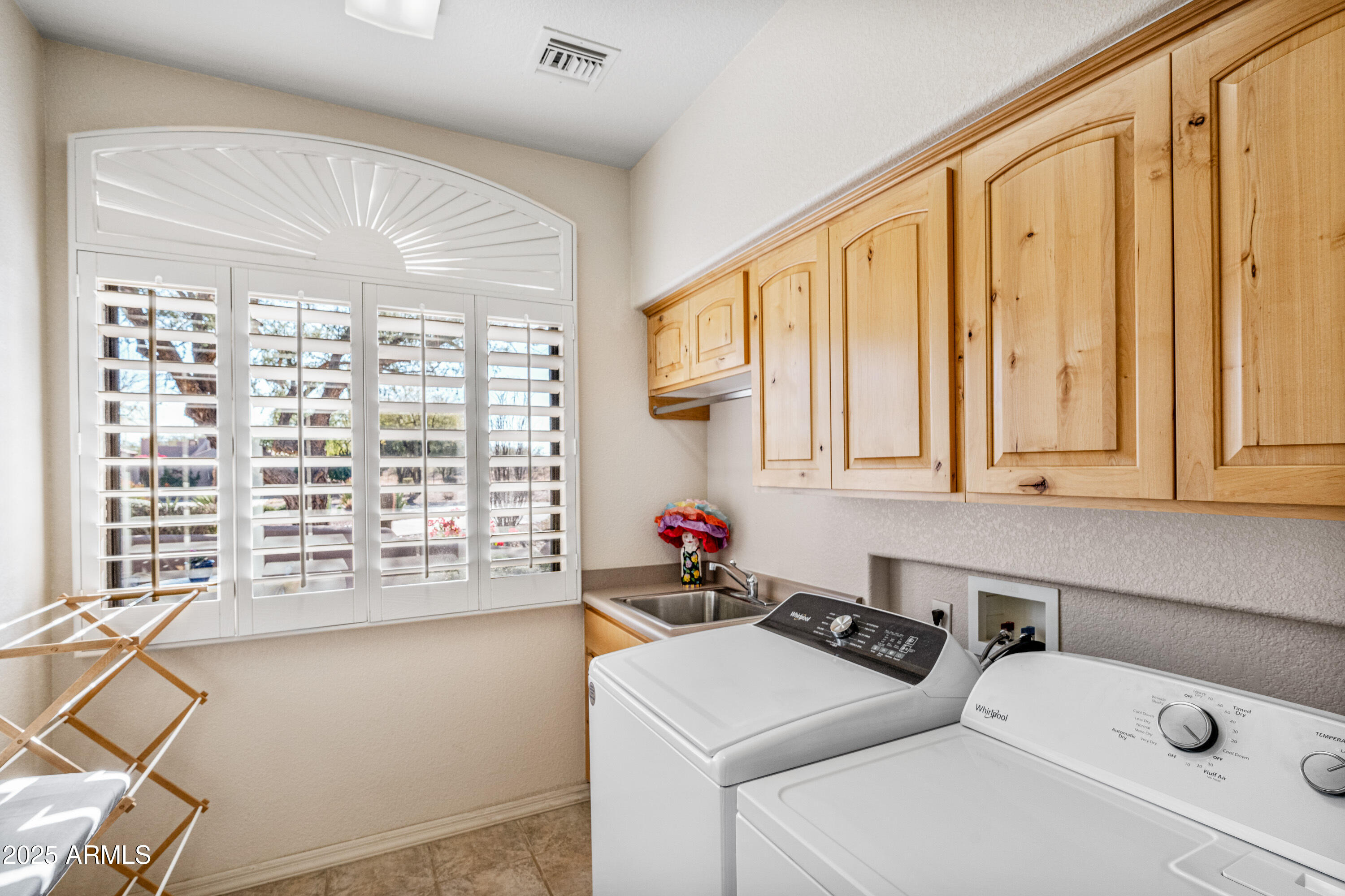 18300 North Tonto Verde Drive Rio Verde, AZ 85263 - Photo 26 of 35 a utility room with dryer and washer