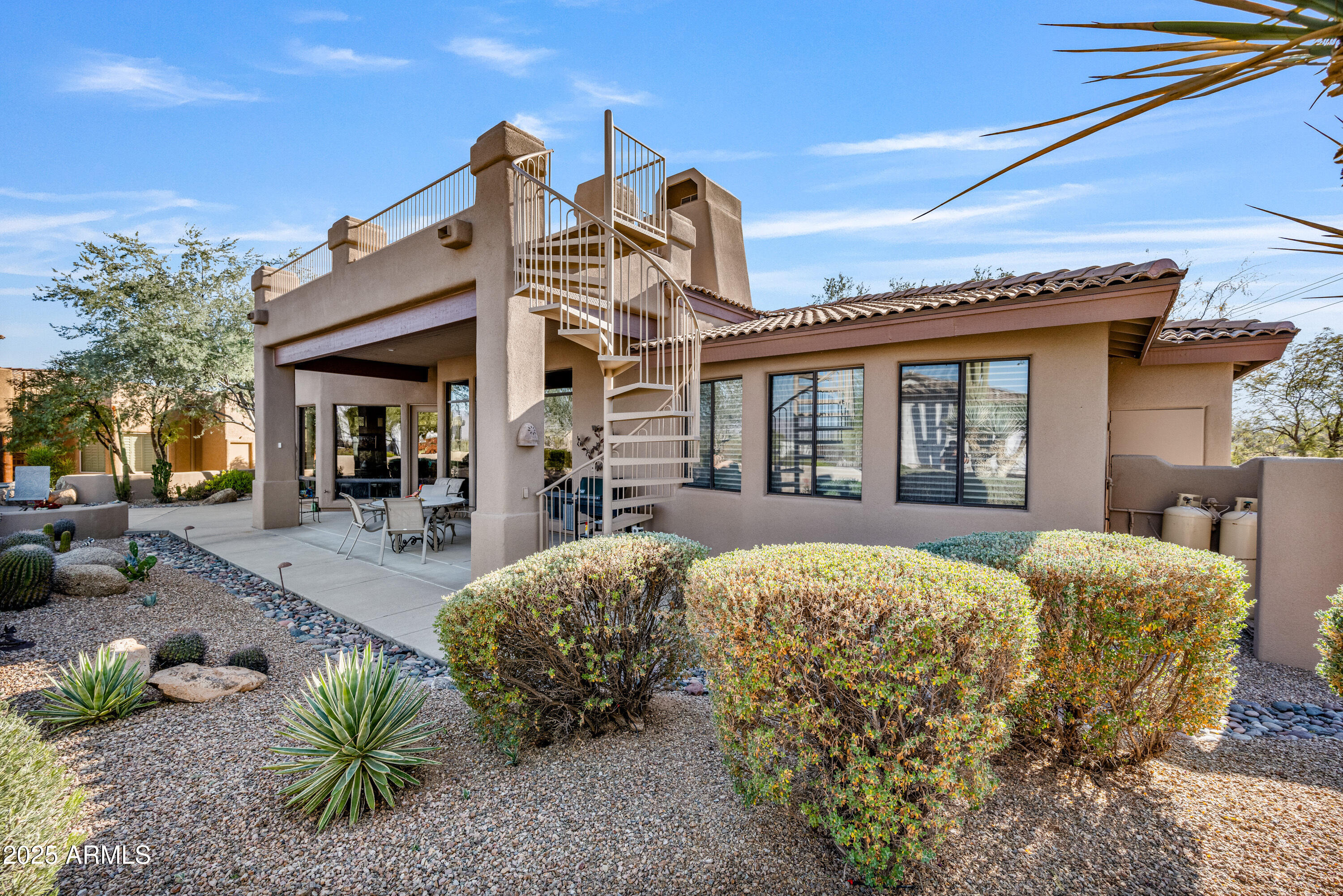 18300 North Tonto Verde Drive Rio Verde, AZ 85263 - Photo 31 of 35 a view of a house with backyard and porch