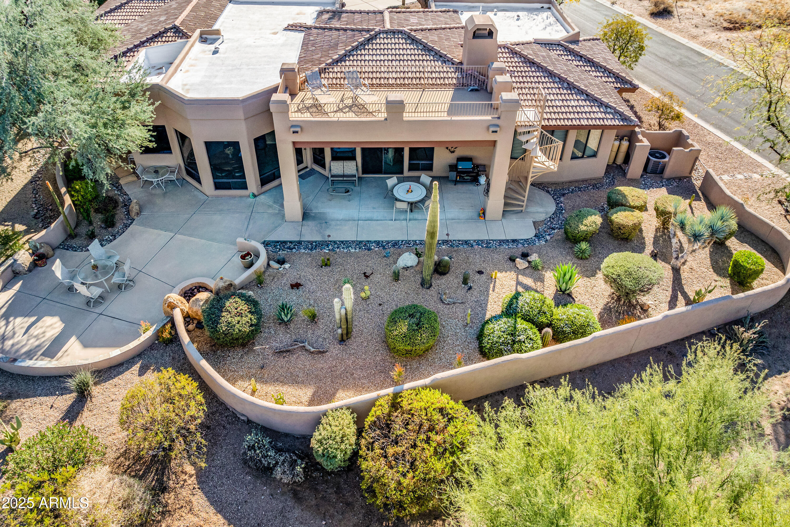 18300 North Tonto Verde Drive Rio Verde, AZ 85263 - Photo 33 of 35 aerial view of a chairs and table in the patio