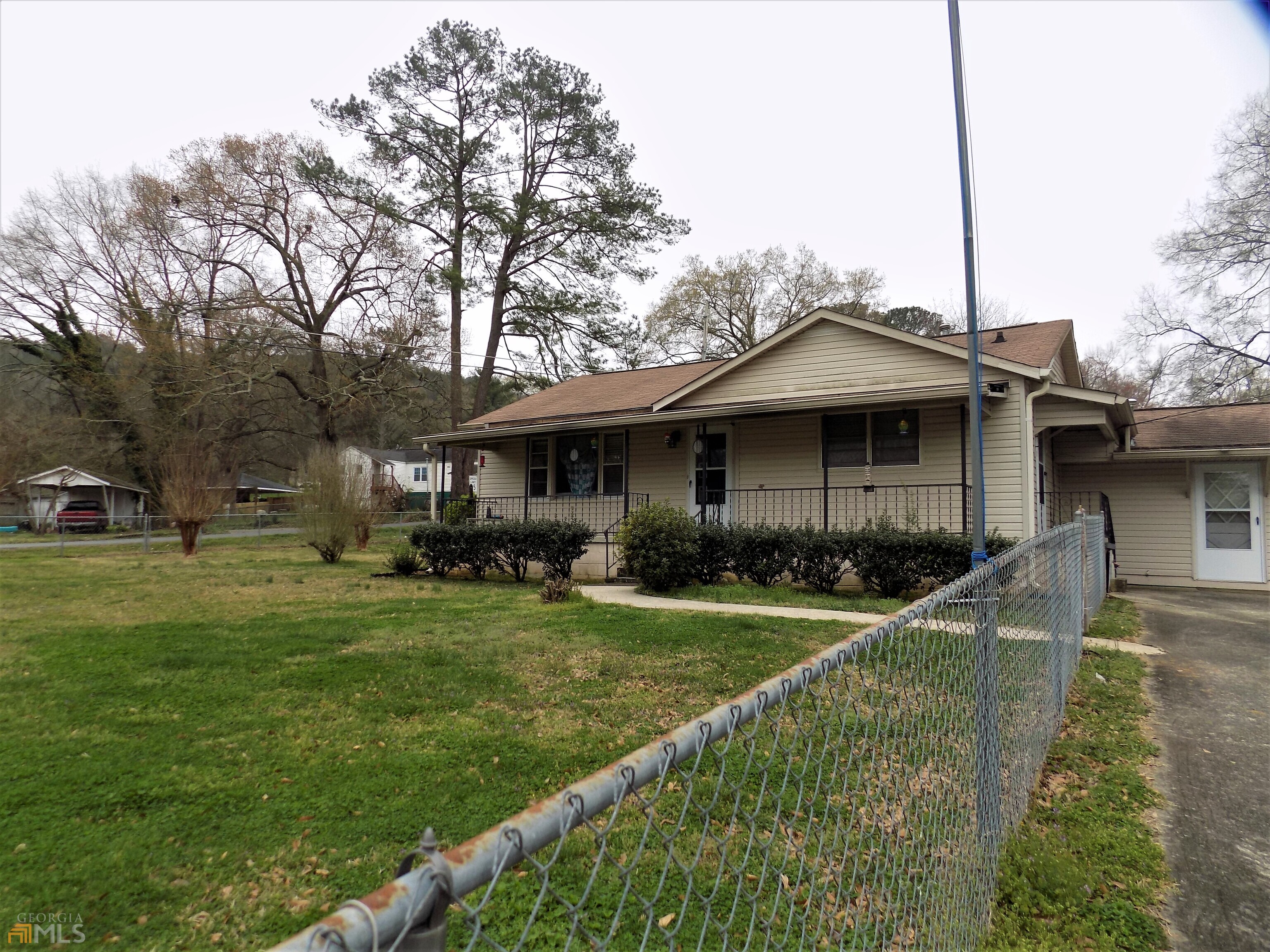 102 Hawthorn Street Rome, GA 30161 - Photo 1 of 1 a front view of a house with a yard