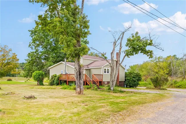 a view of a house with a swimming pool