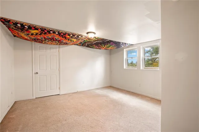 an empty room with windows