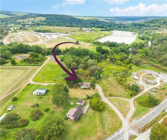 a view of an ocean and a mountain