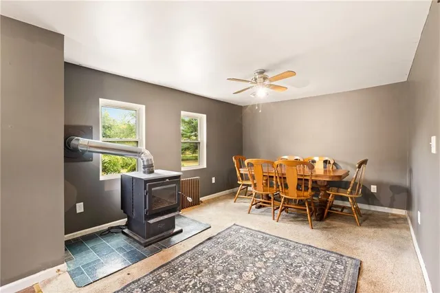 a workspace with furniture and a window