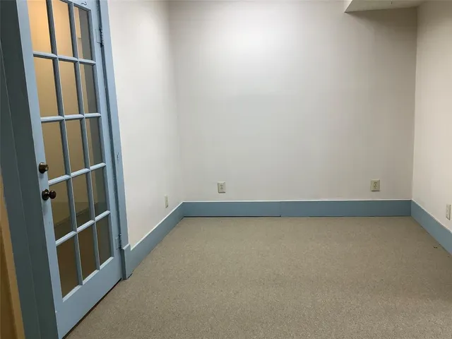 a view of a room with rack on the wall