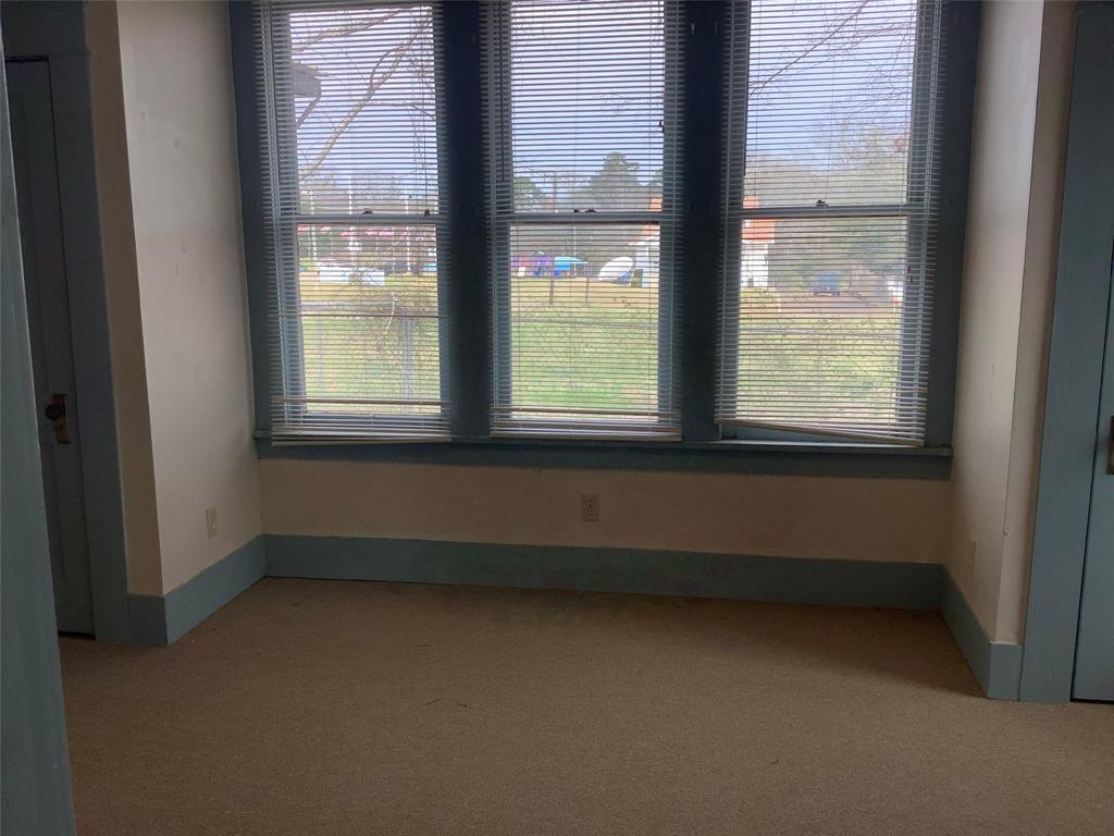 107 Crosby Street Mansfield, LA 71052 - Photo 19 of 29 a view of an empty room with a window