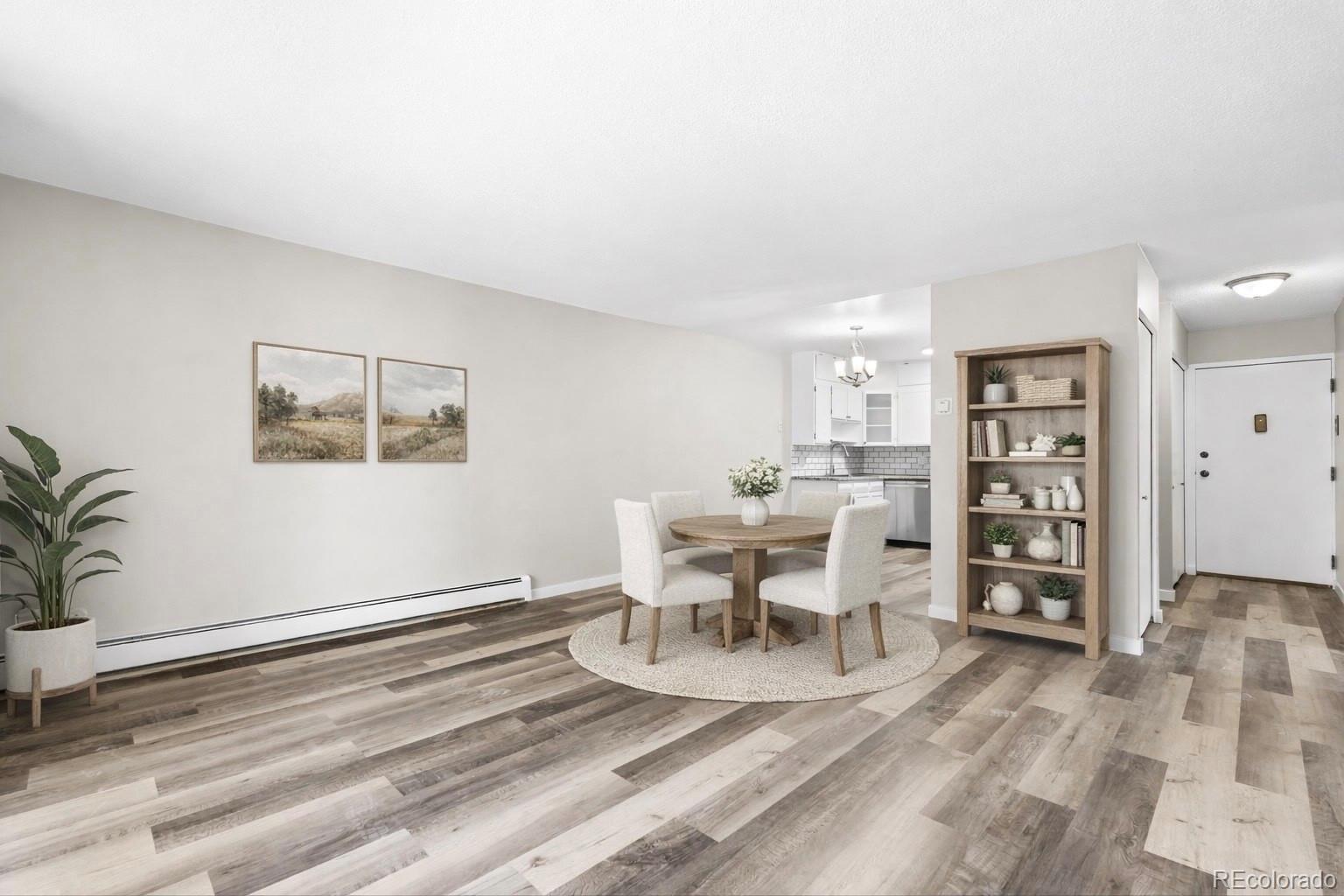 9335 Center Avenue, Unit 1B Denver, CO 80247 - Photo 3 of 15 a view of a work space with furniture and window