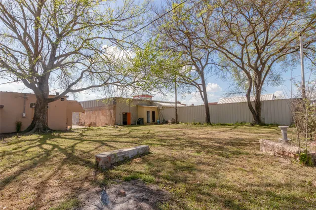 a house with trees in front of it