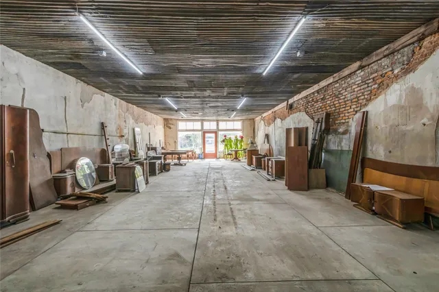 a view of parking garage with gym equipment