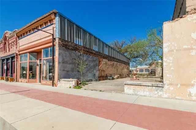 a view of a building along the street