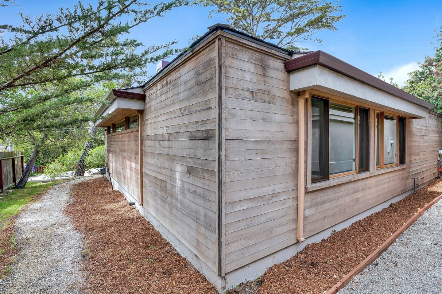Se Corner Se Corner Carmel, CA 93923 - Photo 15 of 35 a view of a house with a small yard