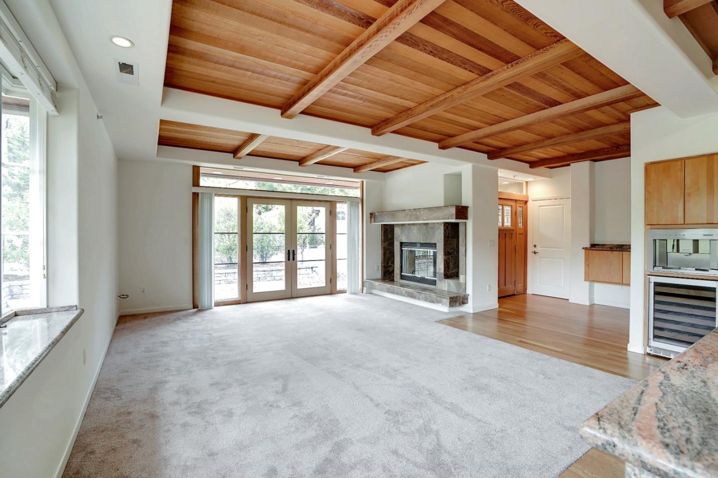 Se Corner Se Corner Carmel, CA 93923 - Photo 16 of 35 a view of an empty room with a fireplace and a window