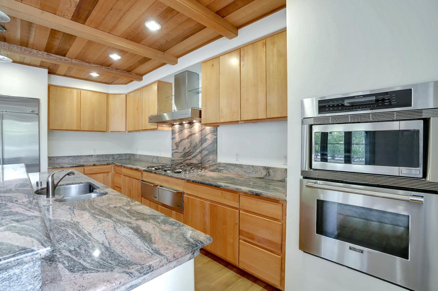 Se Corner Se Corner Carmel, CA 93923 - Photo 20 of 35 a kitchen with granite countertop a sink and stainless steel appliances