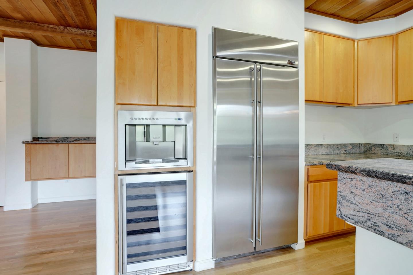 Se Corner Se Corner Carmel, CA 93923 - Photo 22 of 35 a kitchen with granite countertop a refrigerator and a sink