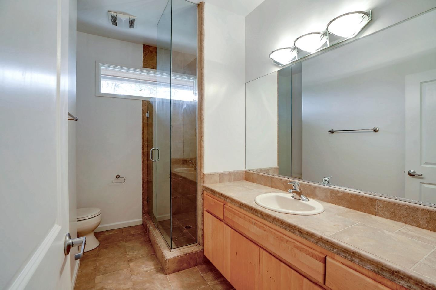 Se Corner Se Corner Carmel, CA 93923 - Photo 31 of 35 a bathroom with a sink a toilet and shower