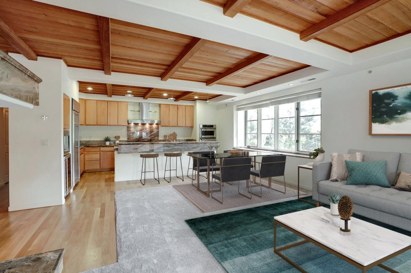 Se Corner Se Corner Carmel, CA 93923 - Photo 5 of 35 a living room with lots of furniture and kitchen view