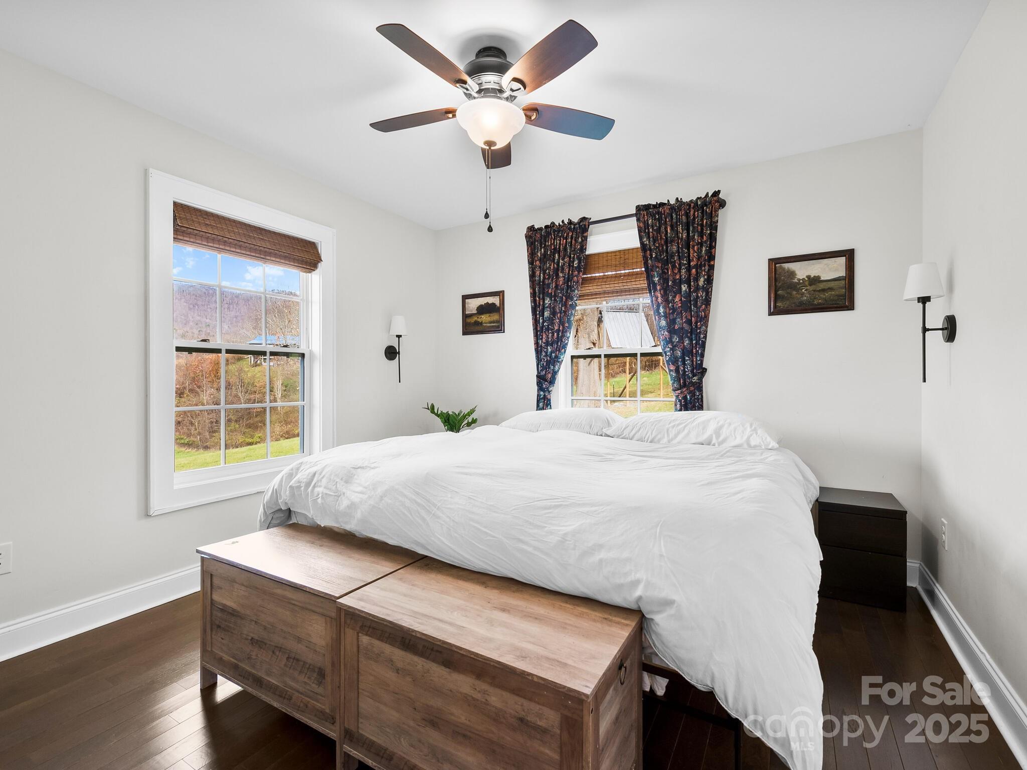 3367 Thickety Road Clyde, NC 28721 - Photo 13 of 21 a bedroom with a bed and a large window