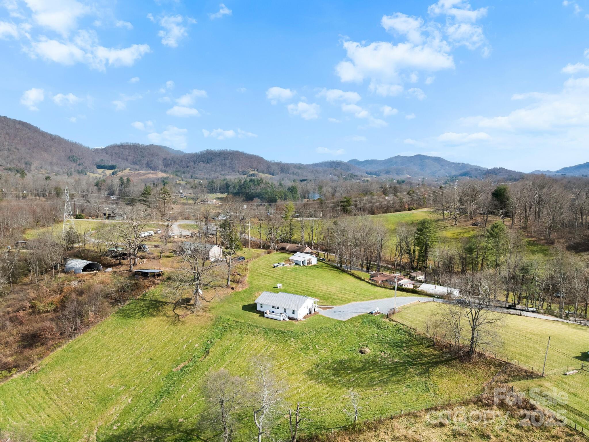 3367 Thickety Road Clyde, NC 28721 - Photo 21 of 21 a view of a lake with a mountain