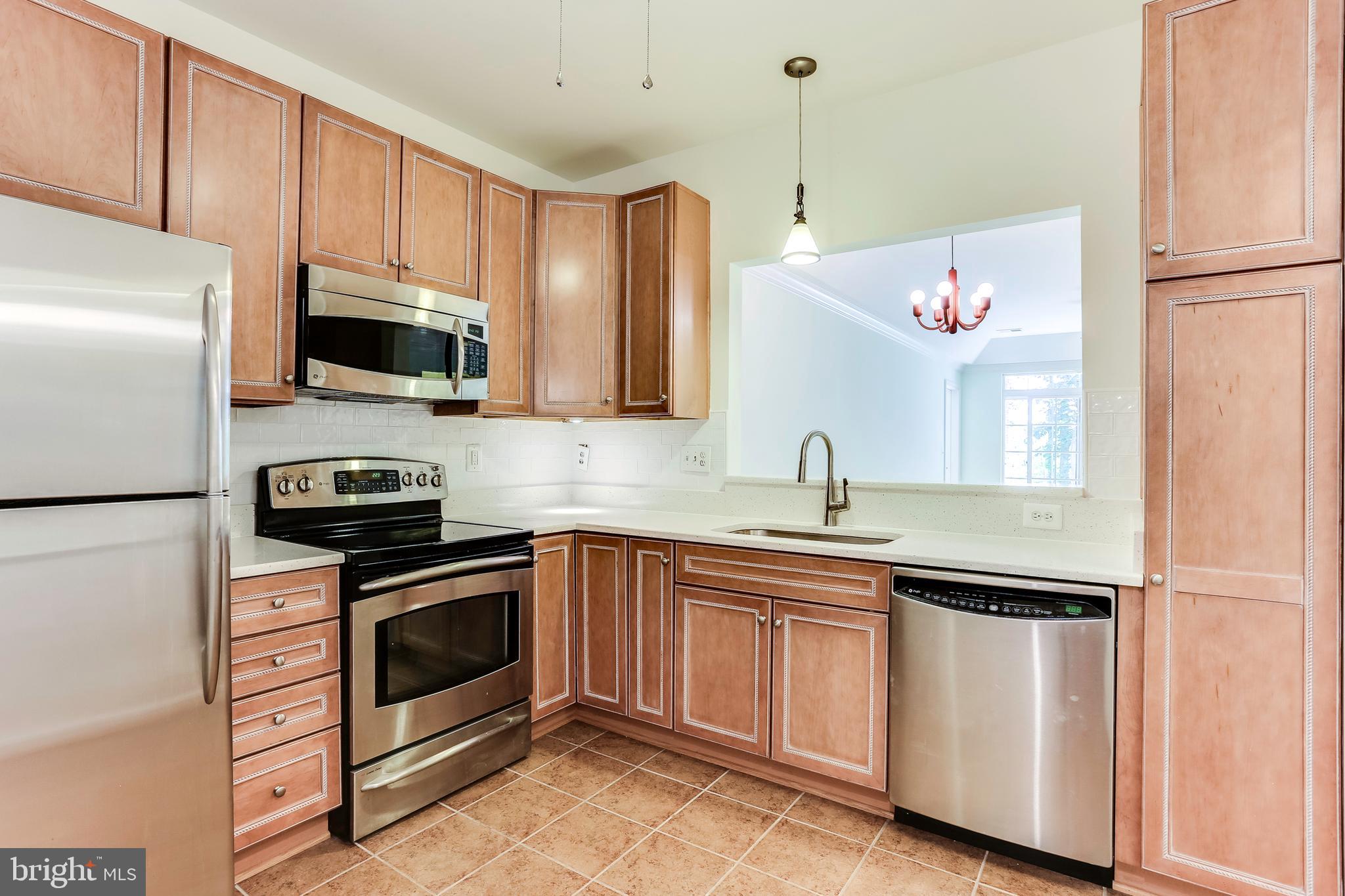 7305 Brookview Road, Unit 105 Elkridge, MD 21075 - Photo 8 of 39 All stainless steel appliances