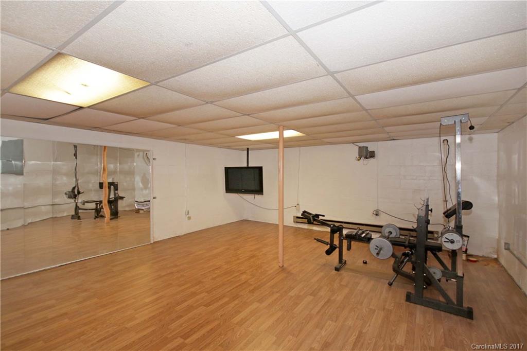 109 South Mccoy Road Salisbury, NC 28144 - Photo 22 of 24 a view of a room with gym equipment and a large window