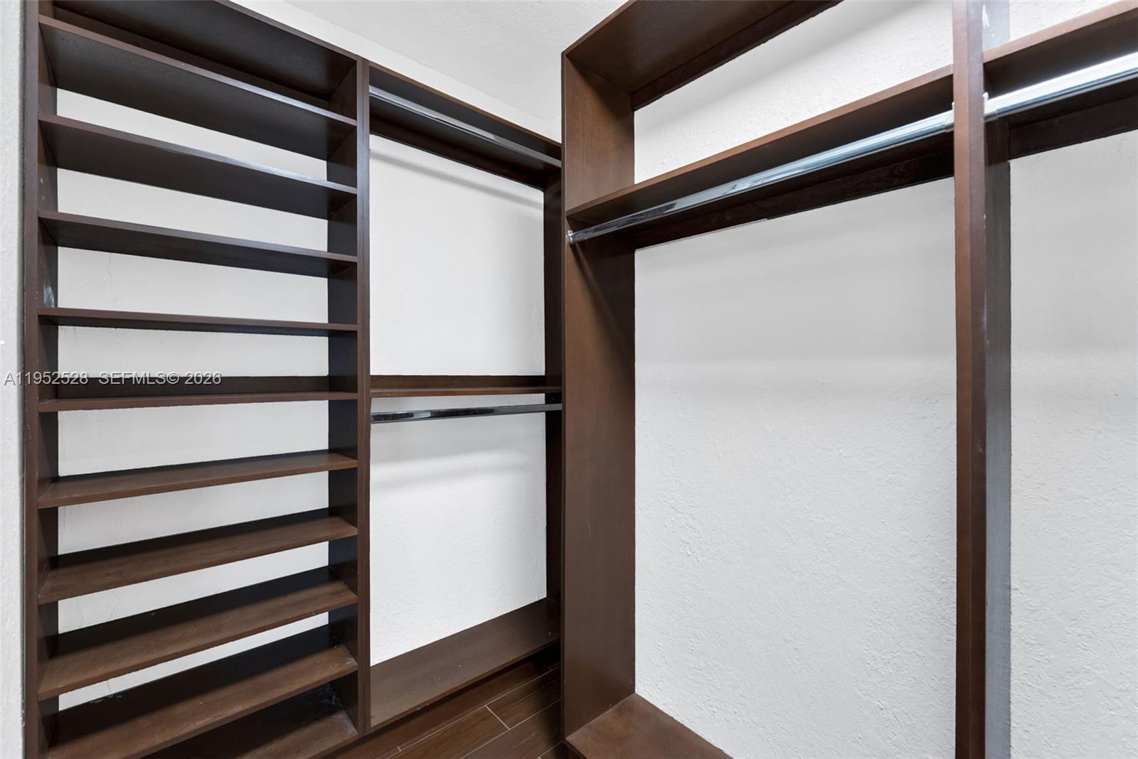 9567 Southwest 59th Terrace Miami, FL 33173 - Photo 24 of 36 a view of walk in closet