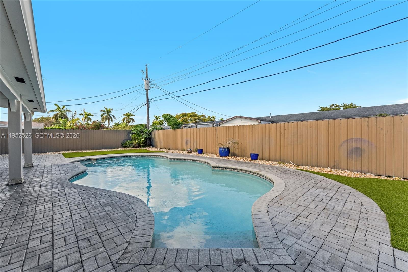 9567 Southwest 59th Terrace Miami, FL 33173 - Photo 29 of 36 a view of a swimming pool