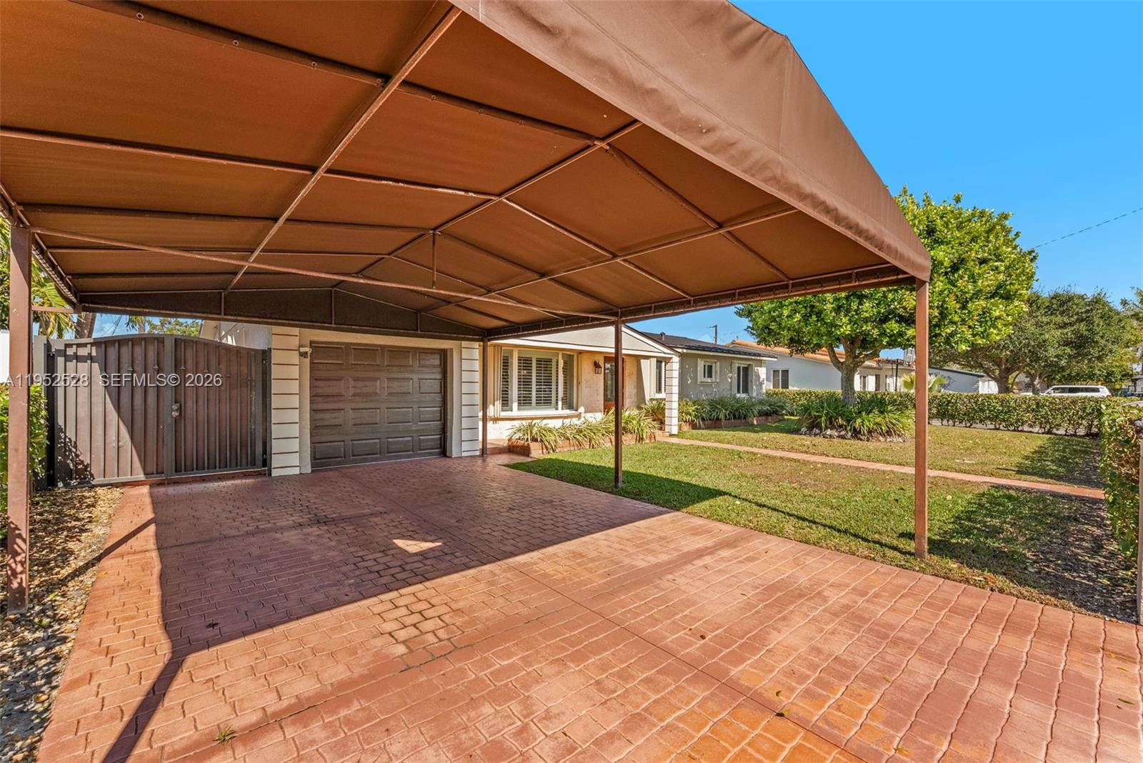 9567 Southwest 59th Terrace Miami, FL 33173 - Photo 3 of 36 a view of a backyard