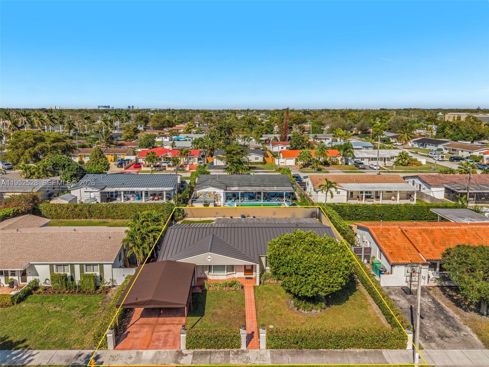 9567 Southwest 59th Terrace Miami, FL 33173 - Photo 32 of 36 an aerial view of residential houses with outdoor space